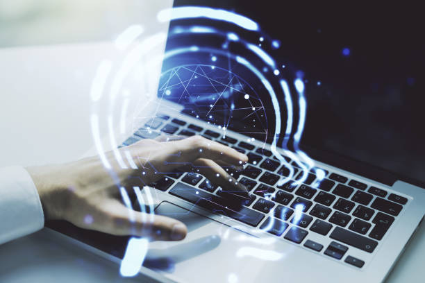 istock Creative artificial Intelligence concept with human head hologram and hands typing on laptop on background. Multiexposure 1470141328