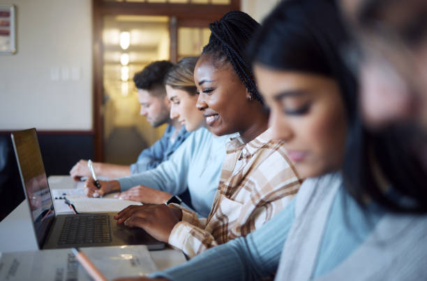 istock Black woman, education and student with university, laptop for study and research for project in campus library. Learning, scholarship and college, happy online for school work and typing report. 1470142627