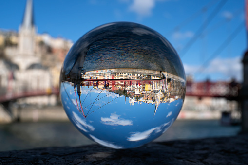 Famous view of Lyon through crystal ball, France