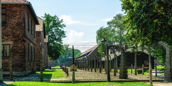 Oswiecim, Poland- 15 August 2022:Electric fence courtyard, Auschwitz Birkenau Concentration Camp Poland