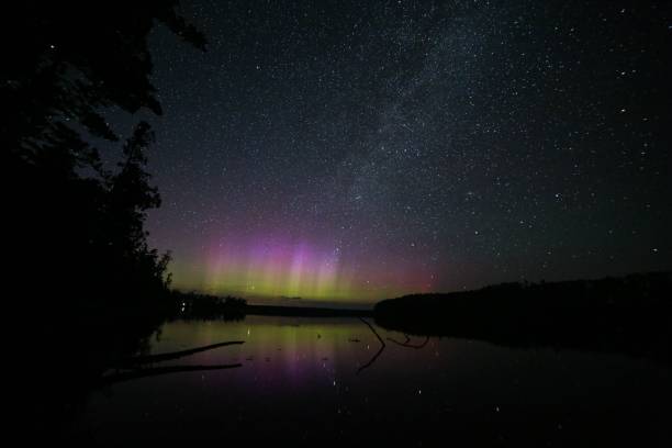 istock Spectacular night sky with a vivid aurora display and a starry sky - great for wallpapers 1470150195
