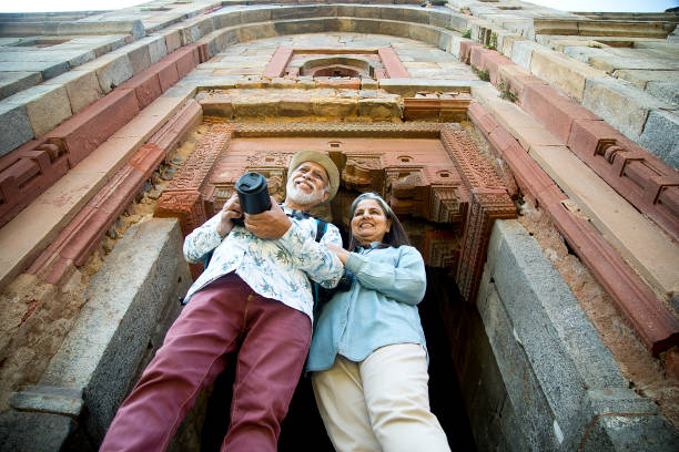 istock Loving old couple spending leisure time at ancient site 1470150262