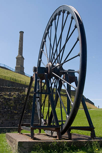 istock Coal Mine Pit Shaft Winding Wheel and Candlestick Chimney 147015030