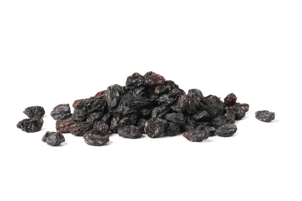 istock Closeup shot black currant dry on white background 1470151034