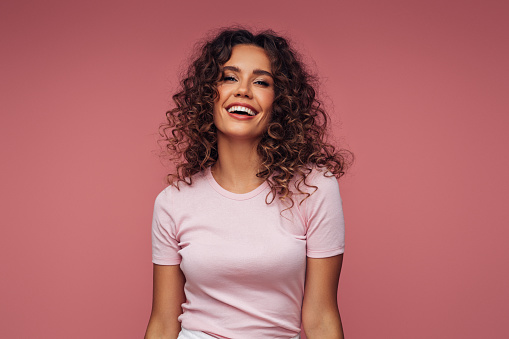 Closeup portrait of a happy young woman