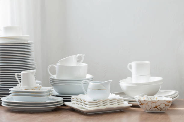 istock various cutlery on a wooden table against a white wall 1470151513