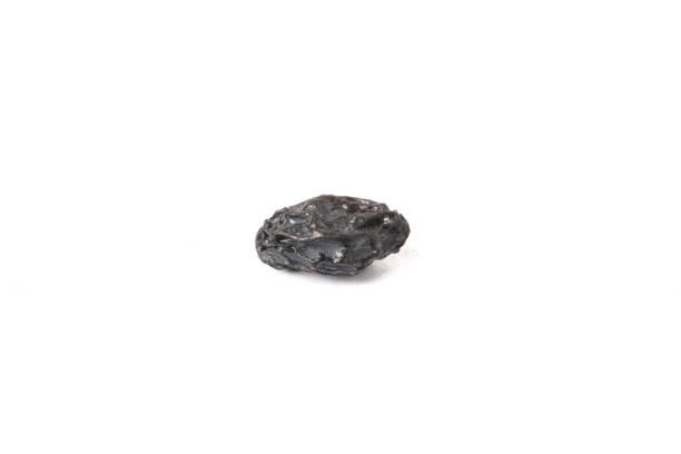 istock Closeup shot black currant dry on white background 1470153545