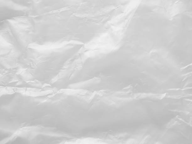 istock Abstract Texture Crumpled Polyethylene White Background,Pattern Crease Plastic Bag with Sun Shine Backdrop,Film Wrap Grunge,Overlay Poster Tape Card Foil Paper Sticker Mockup Pack 1470153826
