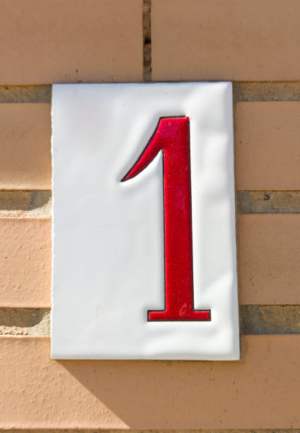 istock House number 1 over brick sunny wall 1470153980