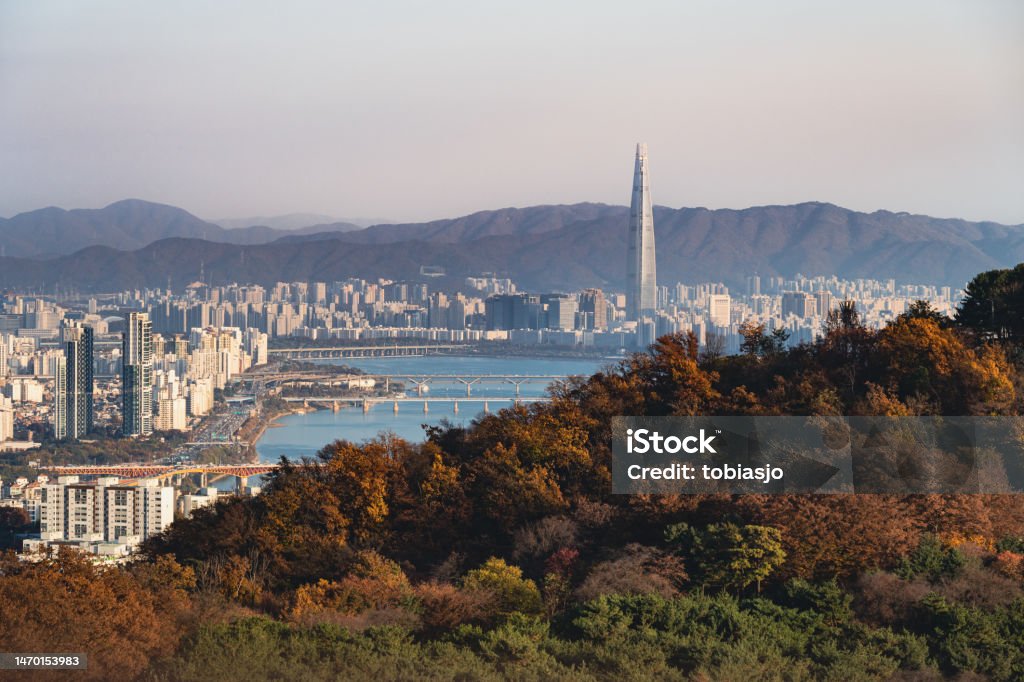 Lotte World Tower in Seoul South Korea The Lotte World Tower in Seoul South Korea is one of the tallest skyscrapers in the world. Surrounded by smaller buildings and a the Han River. Seoul Stock Photo