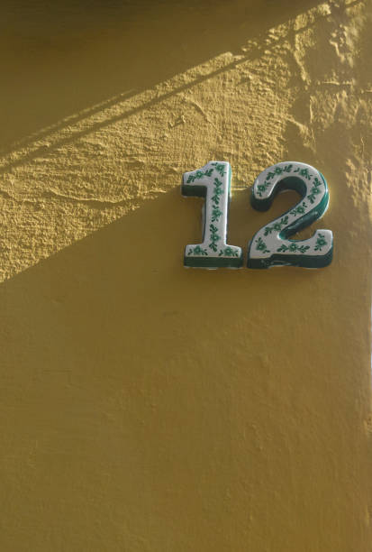 istock House number 12. Glazed decorated numbers 1470153988