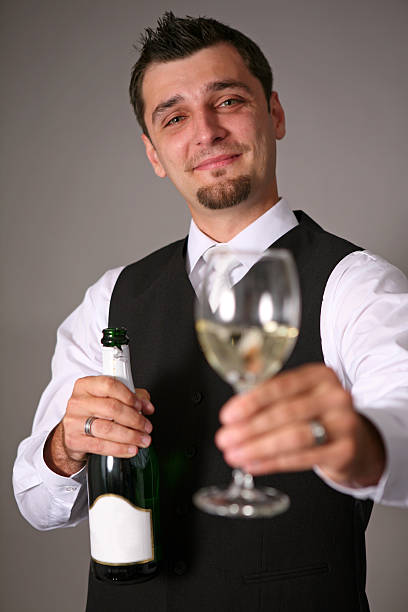 novio con una botella de champán - high society men tuxedo party fotografías e imágenes de stock