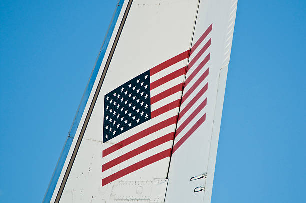 american flag on tail of airplane stock photo