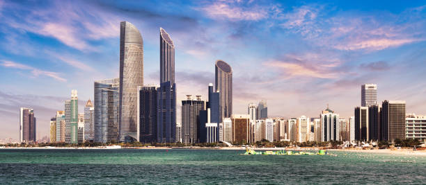istock Abu Dhabi skyline with reflection in sea, United Arab Emirates - panorama 1470155949