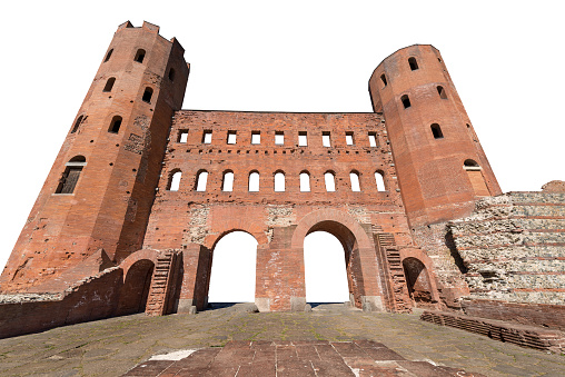 Ancient Roman ruins of Palatine gate and towers (Porta Palatina), isolated on white background, Turin downtown (Torino), Piedmont, Italy, Europe.