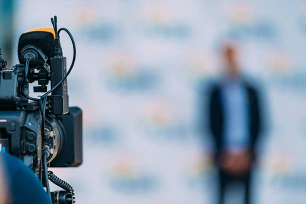 istock Camera at a media press conference publicity outdoors. 1470156993
