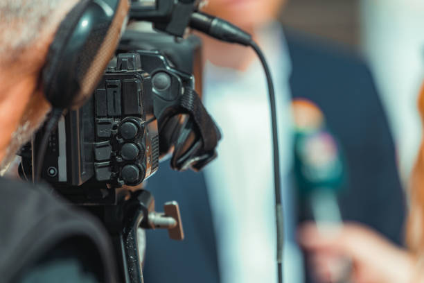 istock Camera at a media press conference publicity outdoors. 1470157121