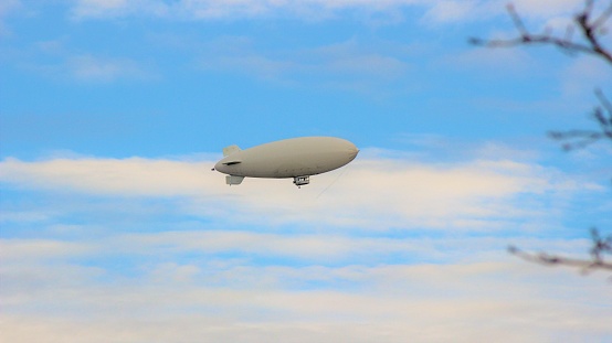 Large blimp with copy space for your message.Could be a great image to announce a big sales promotion.This is a detailed 3d rendering.