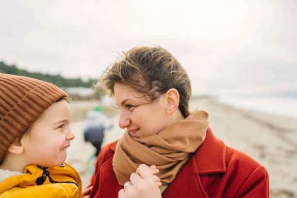 istock Windy day at the beach with mom 1470158134