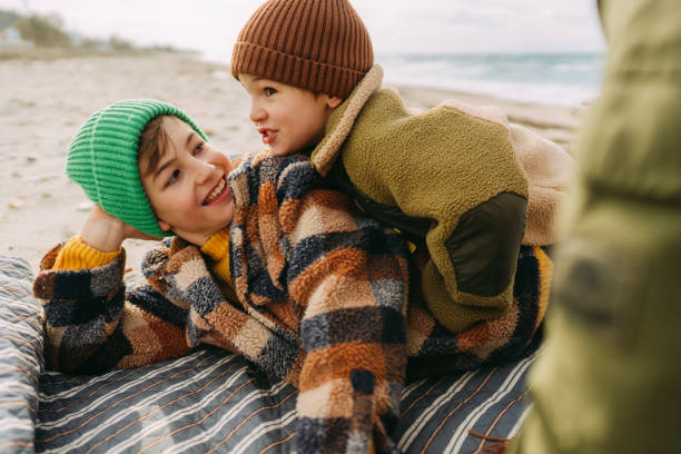 istock Boys on the beach at wintertime 1470158167