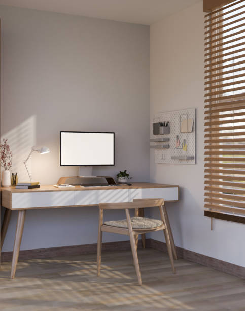 istock Cozy minimal home workspace interior design with PC computer mockup on table, wood armchair 1470158831