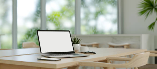 istock Close-up image, Laptop mockup and decor on wood dining table in minimal home dining room 1470159191