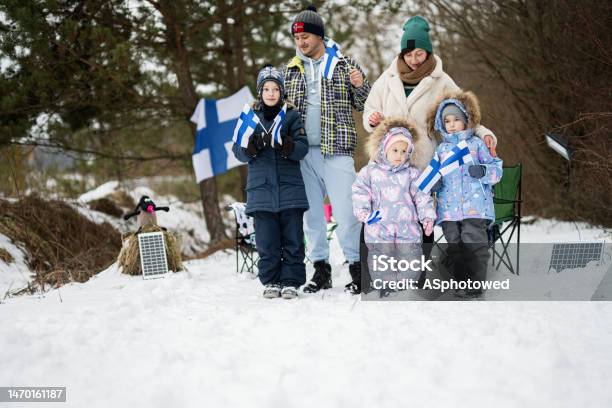 Finnish Family With Finland Flags On A Nice Winter Day Nordic Scandinavian People Stock Photo - Download Image Now