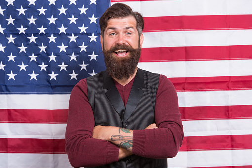 For the future. american education reform in july 4. american citizen at usa flag. american citizen in the election. happy celebration of victory. bearded hipster man being patriotic for usa.