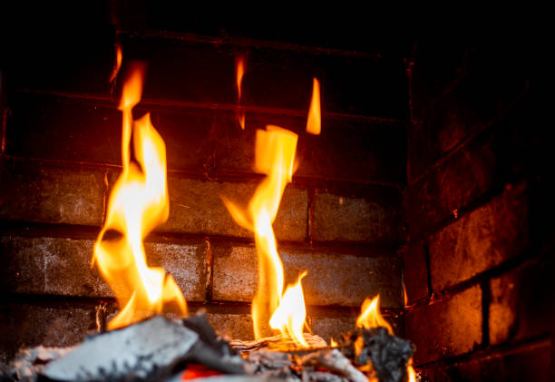 istock orange flames of fire in the fireplace. Horizontal 1470161774