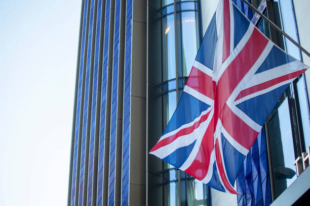 istock Union Jack flag outside a modern building in London 1470161934
