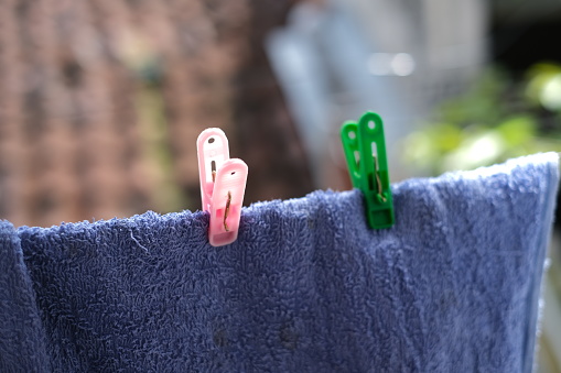 towels that are being dried with the clasps on the outside