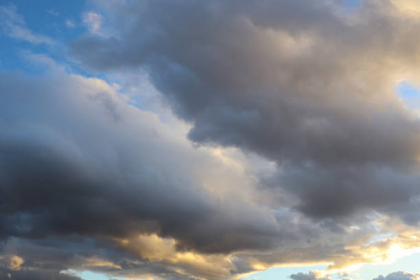 istock Dramatic Sky with Grey Clouds and Orange Sky around Sunset Time about to Rain 1470165158