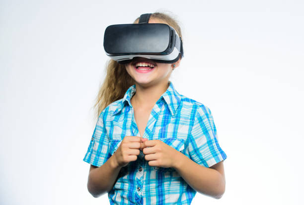istock Girl cute child with head mounted display on white background. Small kid use modern technology virtual reality. Virtual education for school pupil. Get virtual experience. Virtual reality concept 1470165261