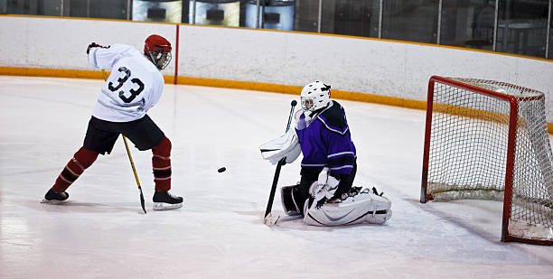 istock Hockey player trick shot 147016943