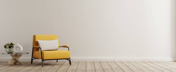 istock Living room interior with yellow fabric armchair and table on empty white wall background. 1470170840