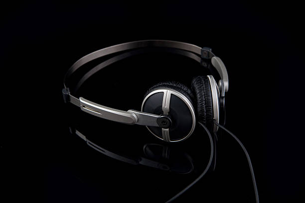 istock stereo headphones on black 147017119