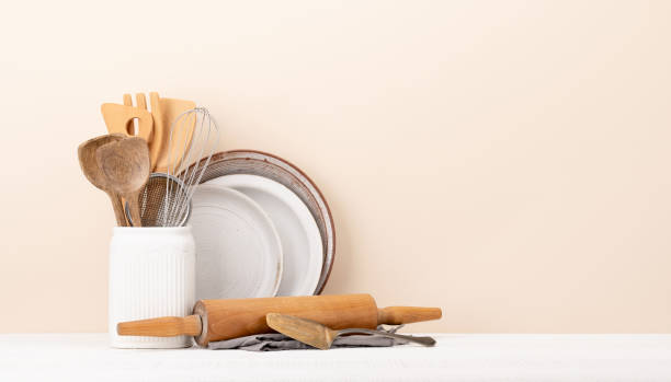 istock Kitchen utensils on wooden table 1470173010