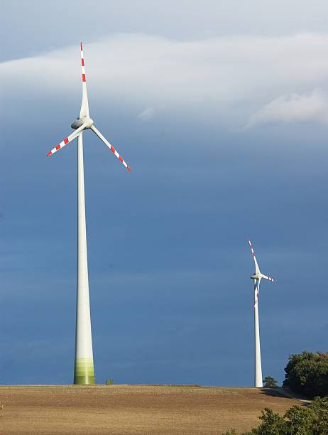 Windmill generating electric energy stock photo