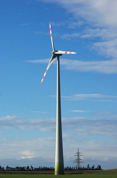 Windmill generating electric energy stock photo