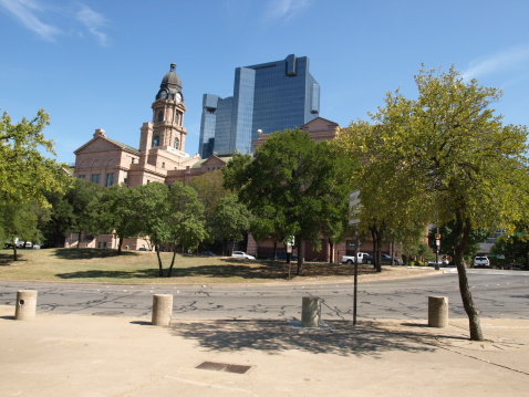 Wide angle shot of the old court house and newer office buildings.