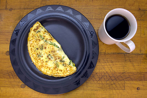Broccoli & Cheese Omelette with Coffee stock photo