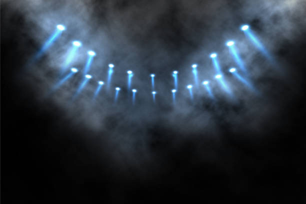 istock Bright stadium arena lights and smoke 1470190531