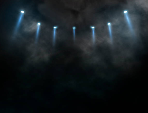 istock Bright stadium arena lights and smoke 1470190532