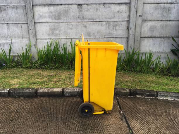 istock Yellow garbage trolley or trash trolley can 1470199956
