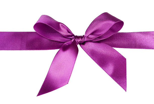 istock Purple satin bow tied with care over a white background 147020101