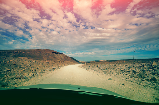 Mountain desert landscape. Colorful sandstone. National Park Makhtesh Ramon Crater in Negev desert, Israel