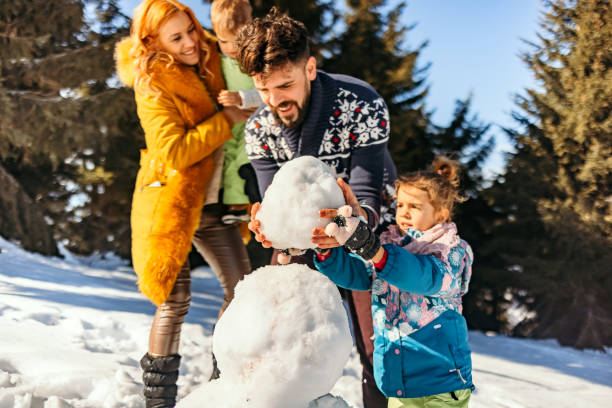 istock Family having fun in winter 1470205640