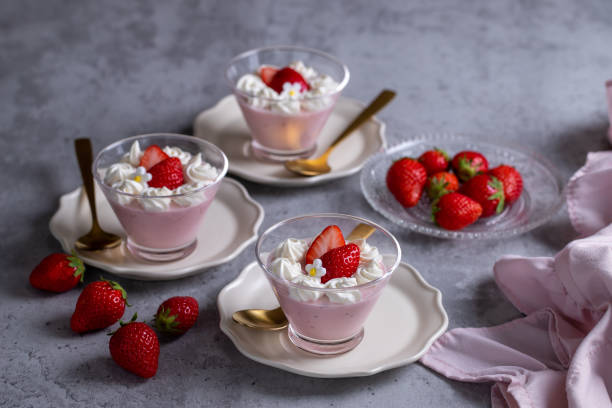 istock Homemade fresh strawberry mousse dessert on a concrete background. 1470207135