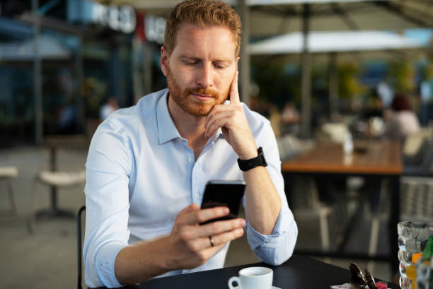 istock Worried man using the phone. 1470208597