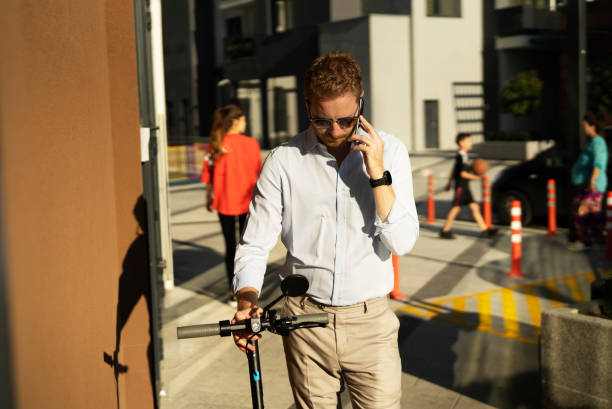 istock Businessman using the phone outdoors. 1470209035